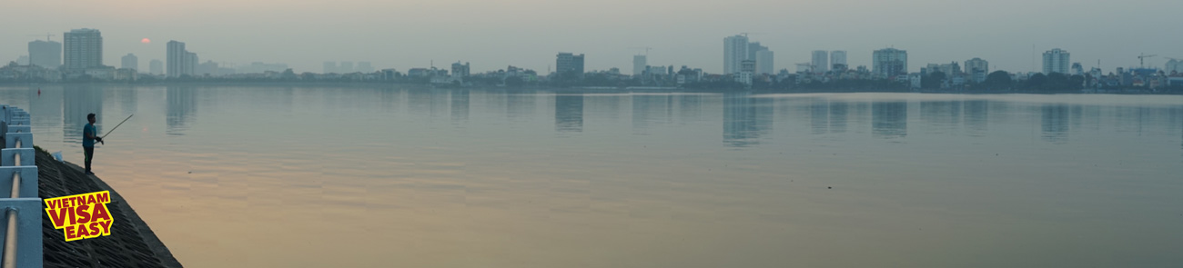 Hanoi's Westlake on a Sunday with a fisherman