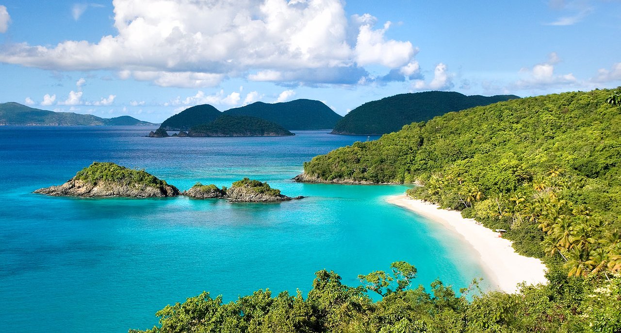 Beach in Cam Ranh Bay Nha Trang with clear blue water and white sand